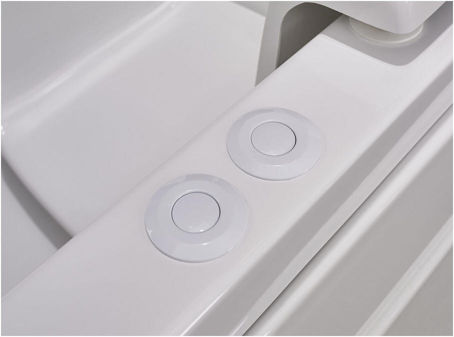 Soft touch buttons to operate the lifting seat are conveniently located next to the bather