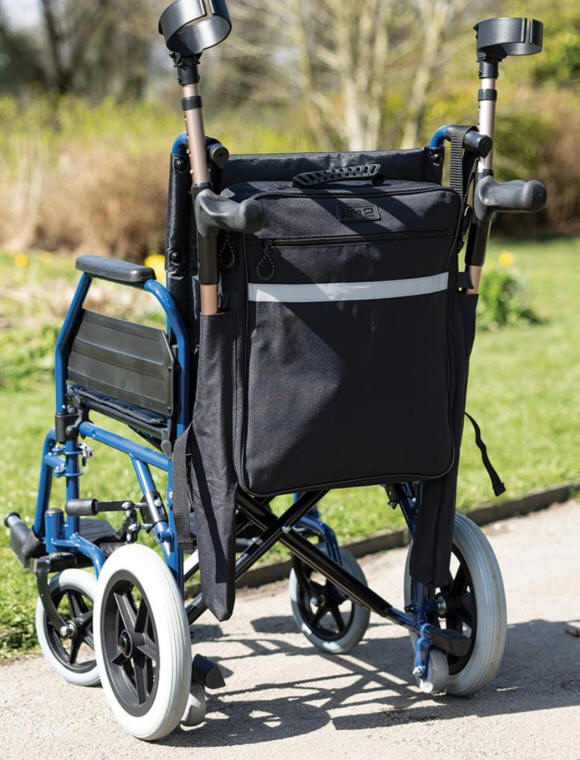 Bags with crutch and walking stick pockets for wheelchairs and mobility scooters