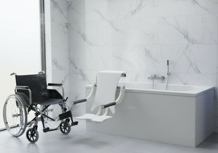 Simple to transfer from a wheelchair to the lifting seat, The OMEGA care bath with powered lift and traverse seat